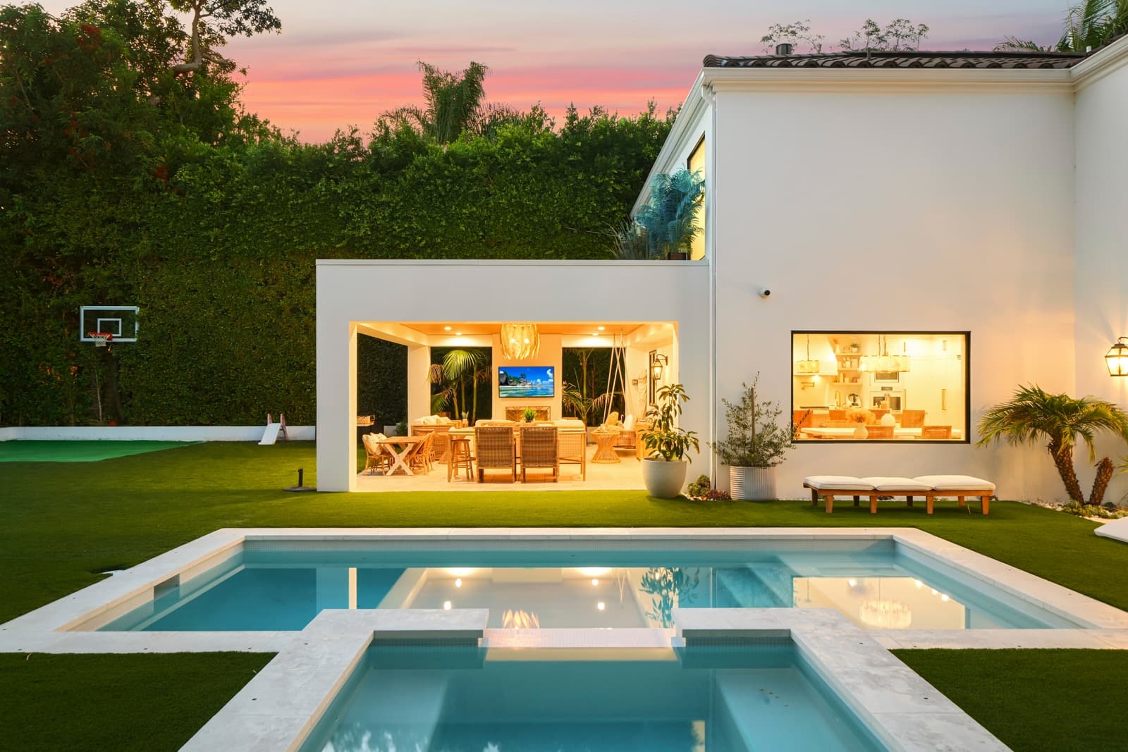 Pool and lounge chairs at twilight, Beverly Hills