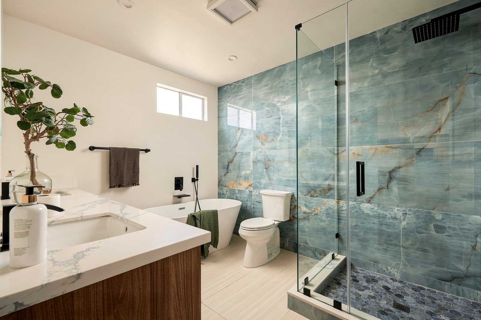 Bathroom with a blue marble walk-in shower