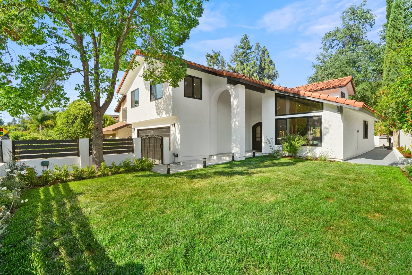 Spanish-style two-story home exterior, photographed by VVT in Calabasas