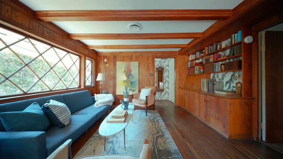 Wood-paneled living room and library at 947 N Beverly Glen Blvd