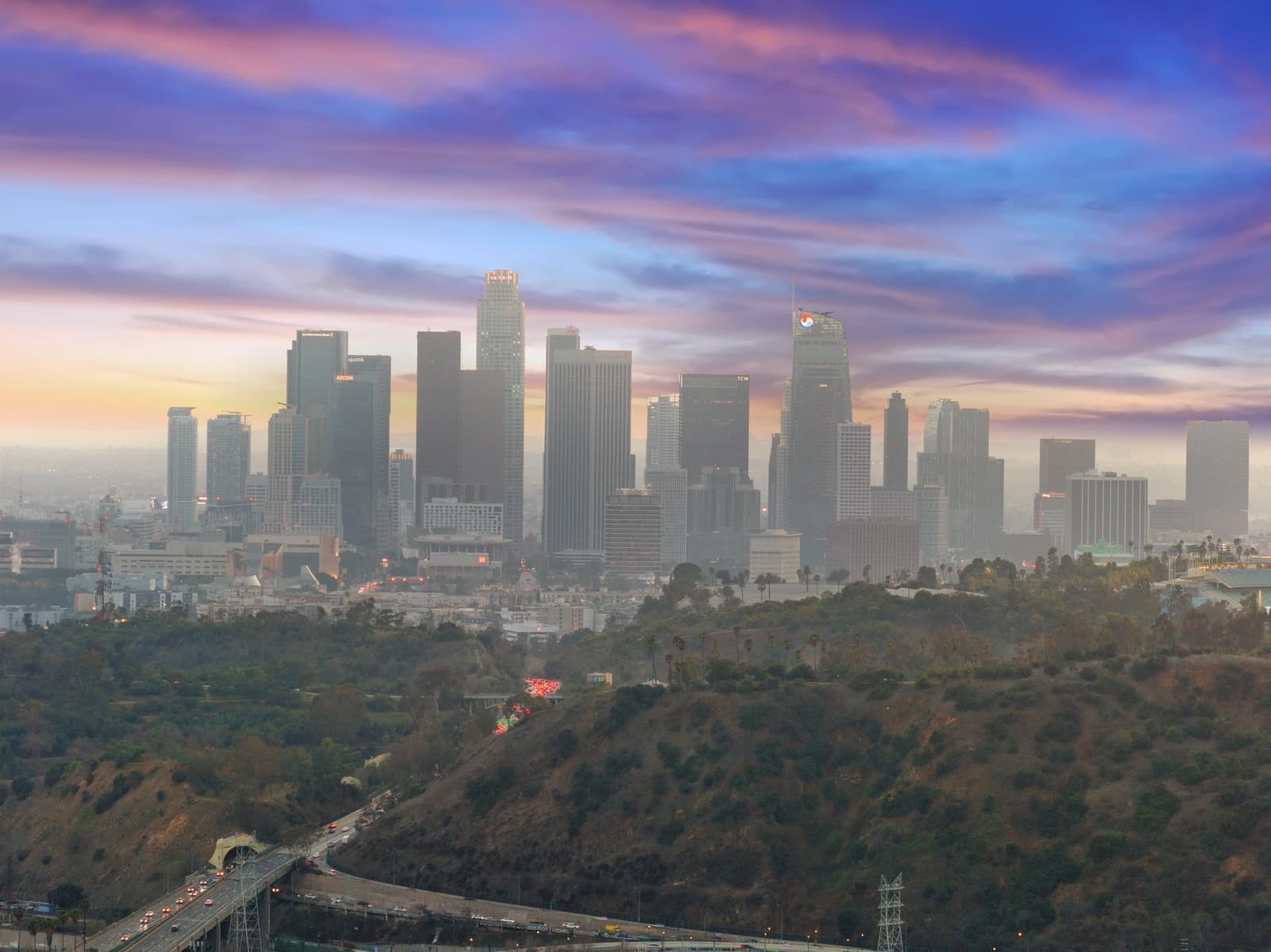 Downtown Los Angeles skyline at sunset from the air