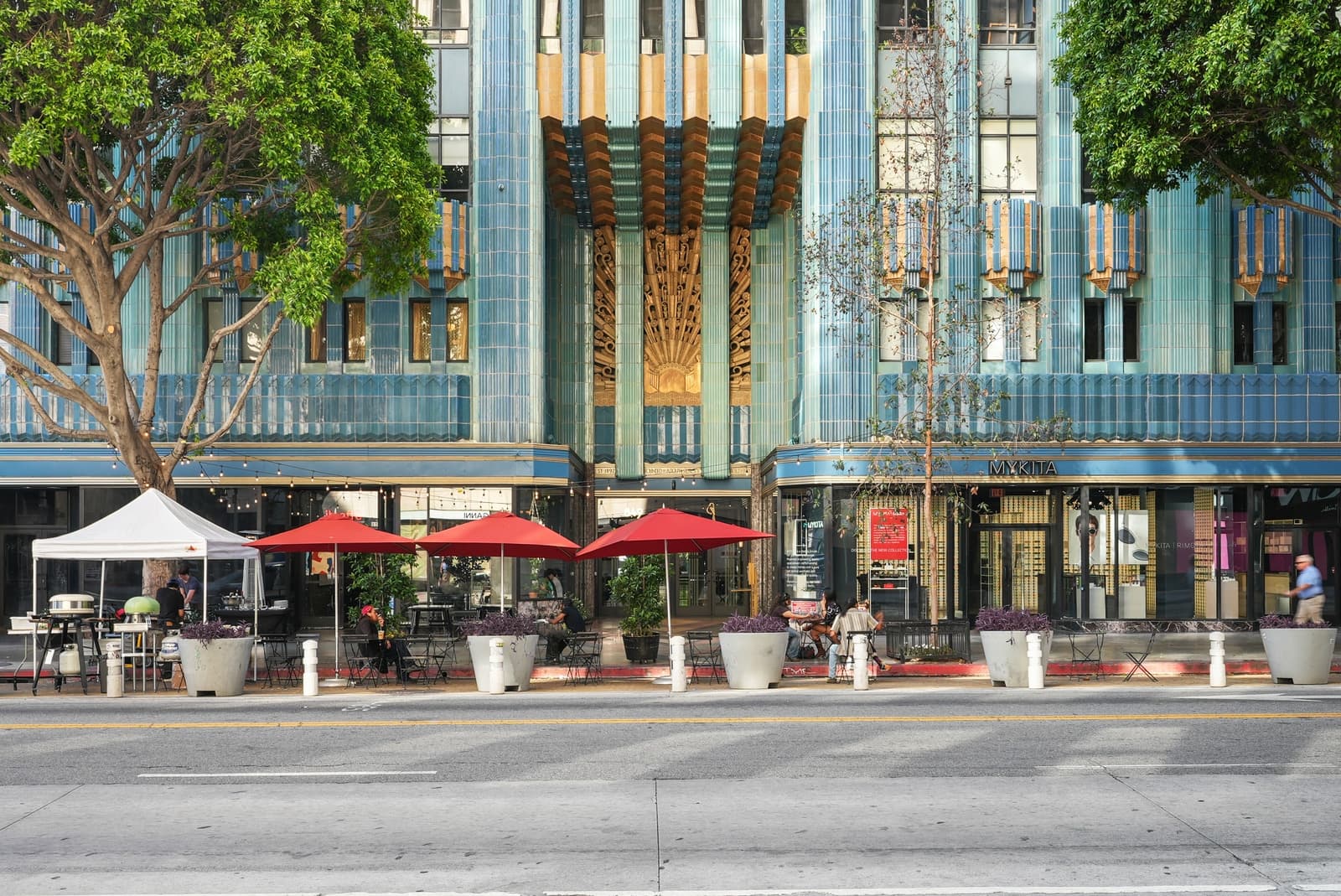 The turquoise Art Deco facade of the Eastern Columbia Building from Broadway