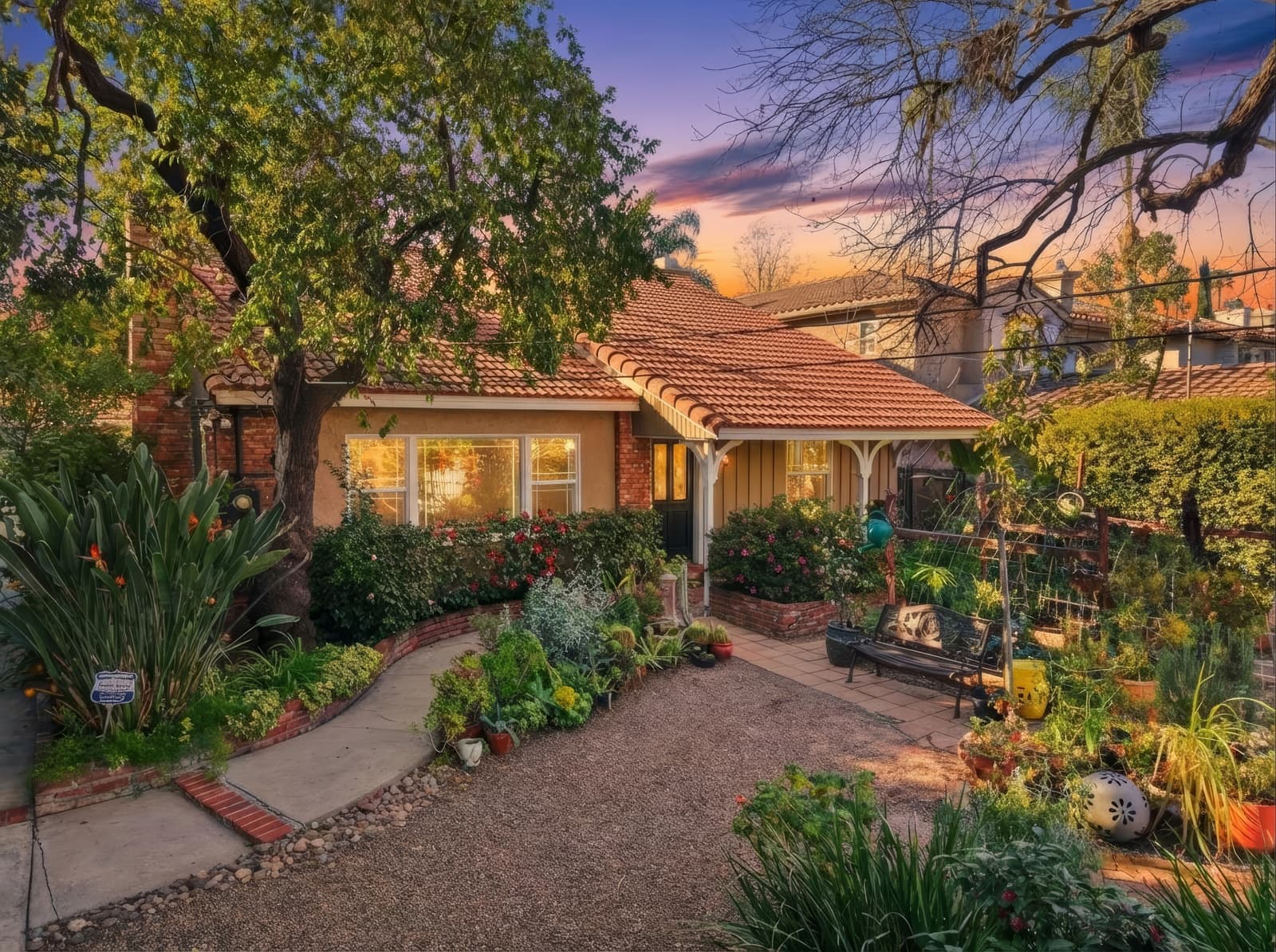 Encino ranch at twilight through the front garden