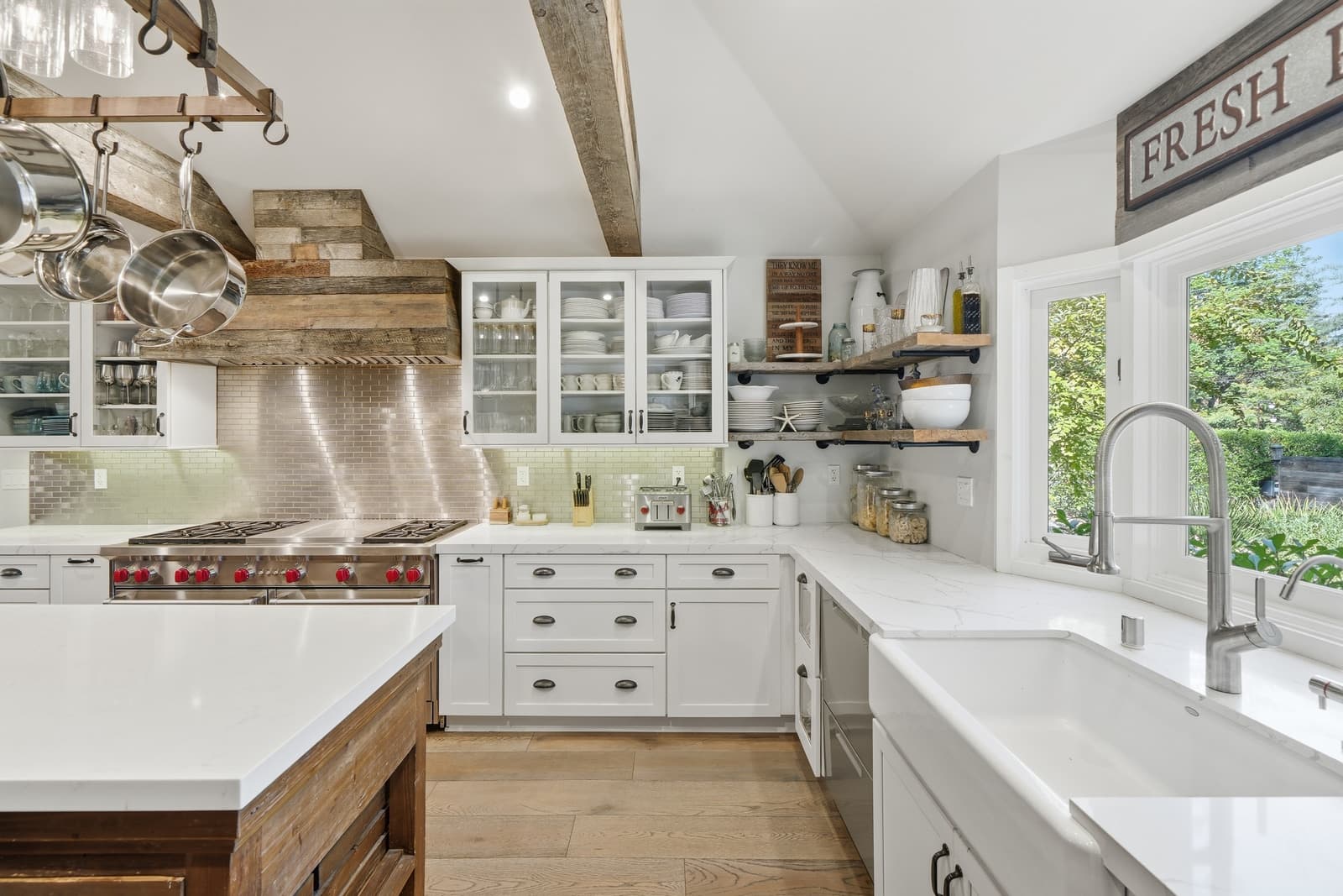 Farmhouse kitchen with a hanging pot rack