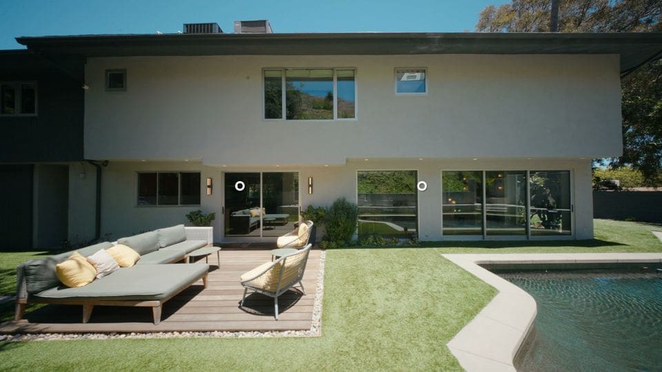 Rear of a Hollywood Hills modern above its pool, from its listing film