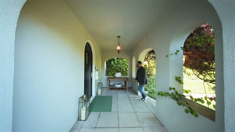Arched loggia of a Mid-City Spanish home, from its listing film