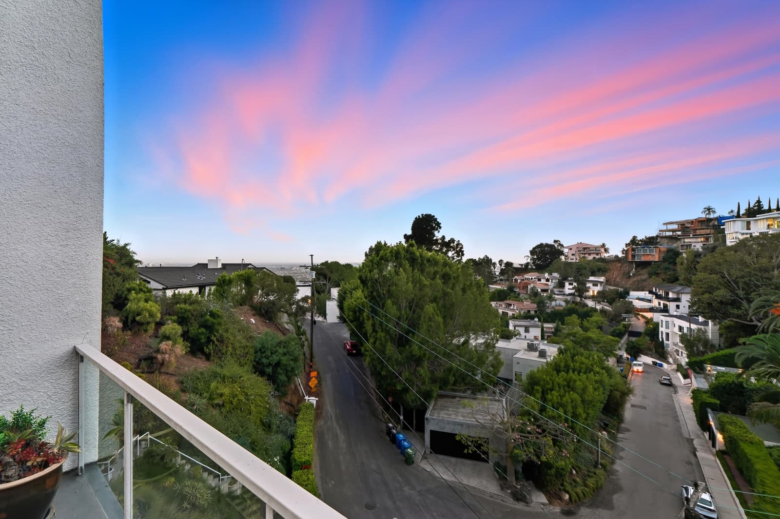 Hillside deck under string lights at twilight, Hollywood Hills