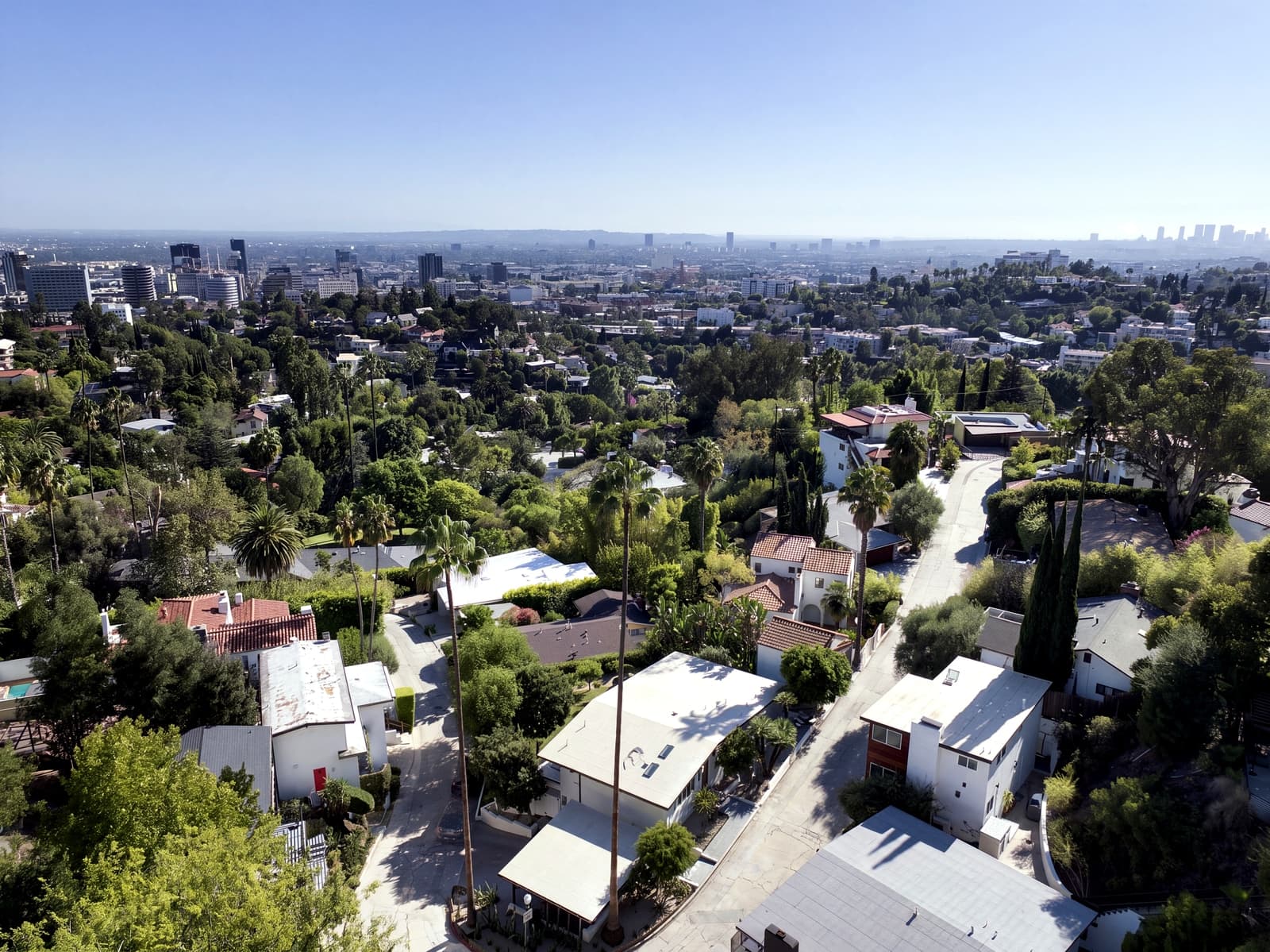 Drone over the Hollywood Hills toward the Century City towers