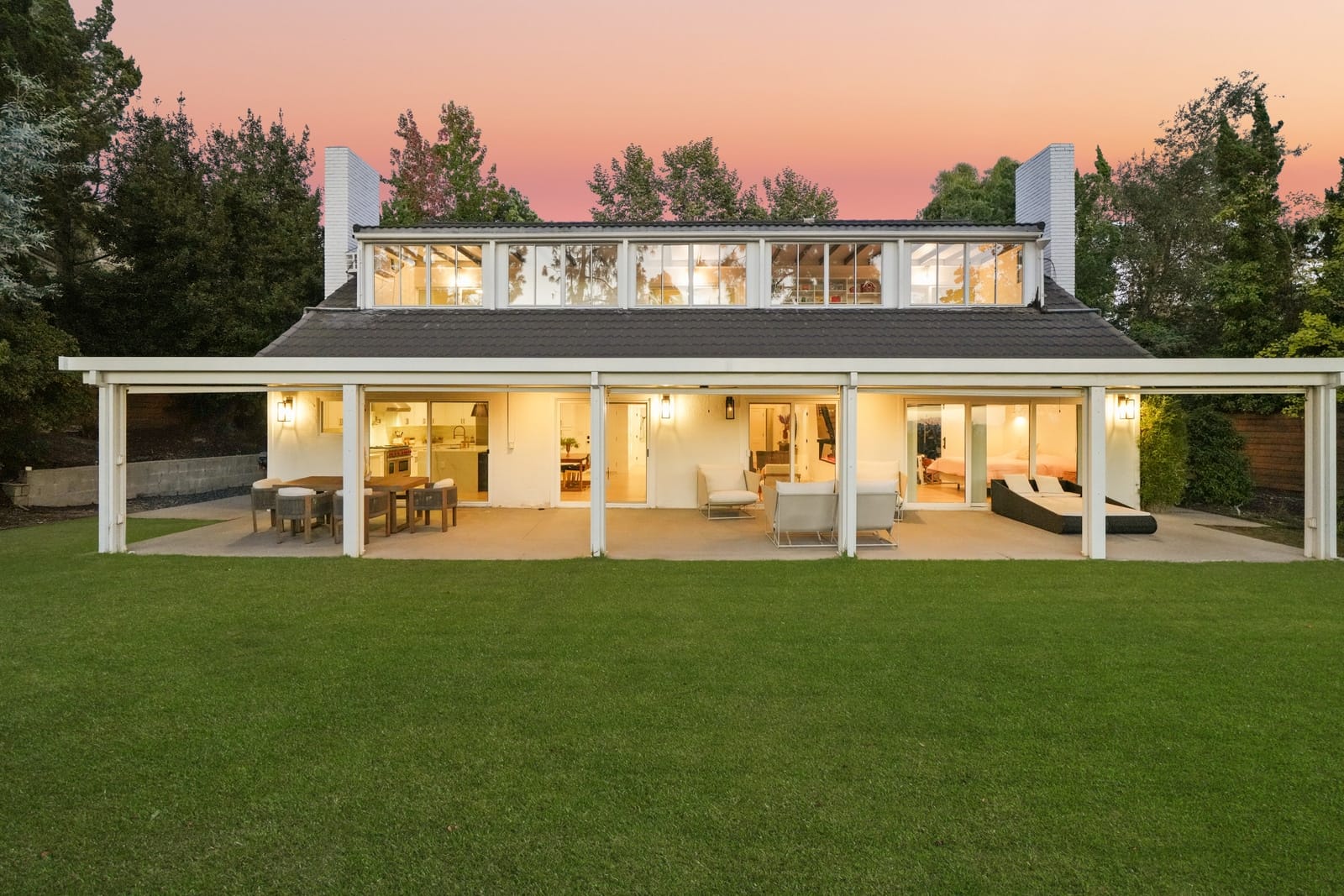 La Cañada modern farmhouse at twilight, clerestory glass