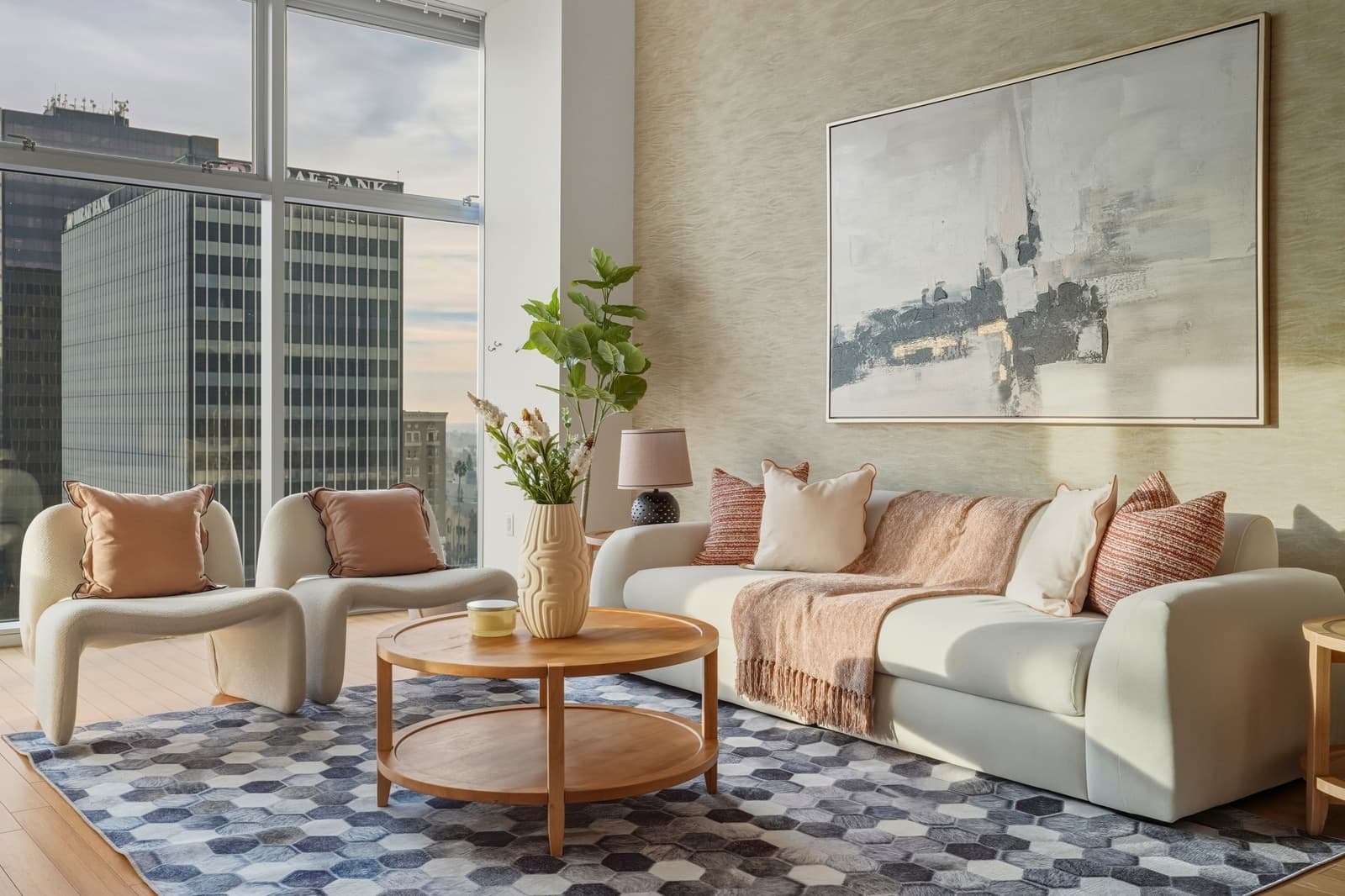 Living room framed by the downtown Los Angeles skyline