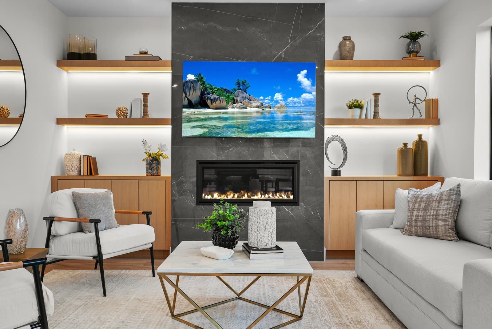 Living room with a linear fireplace and built-ins