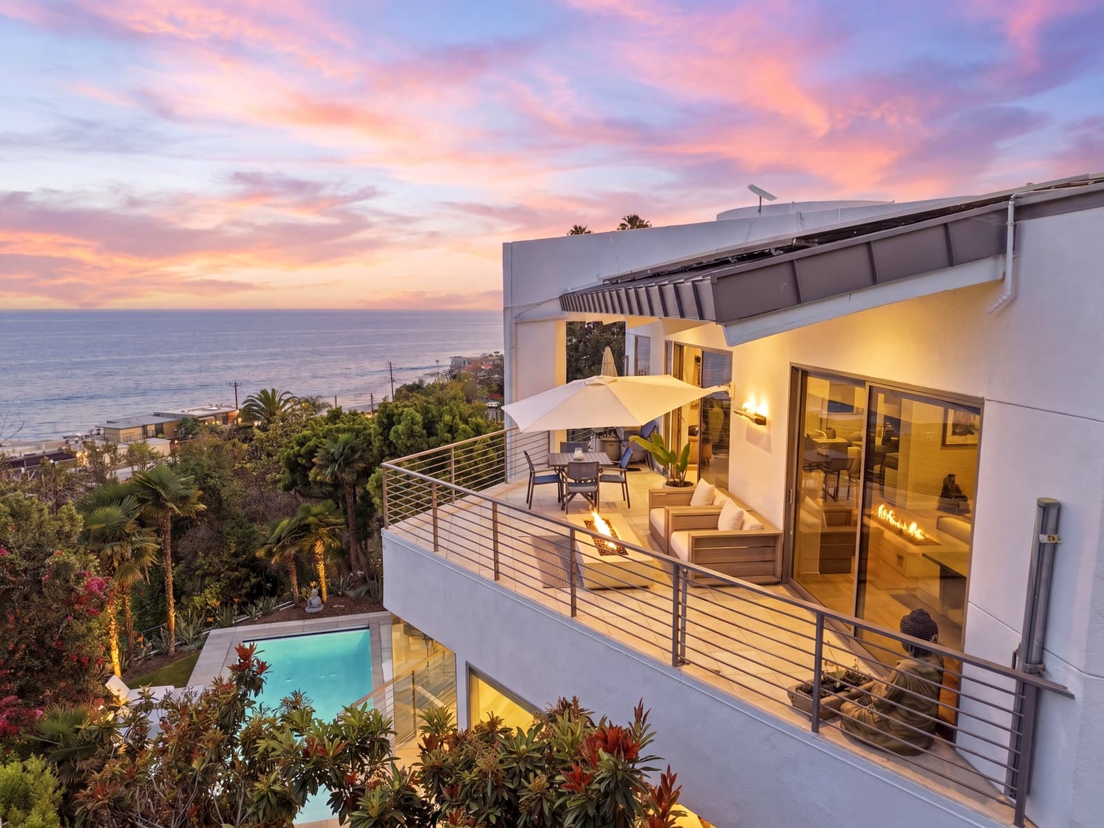 Balcony at twilight over the pool toward the ocean, Malibu