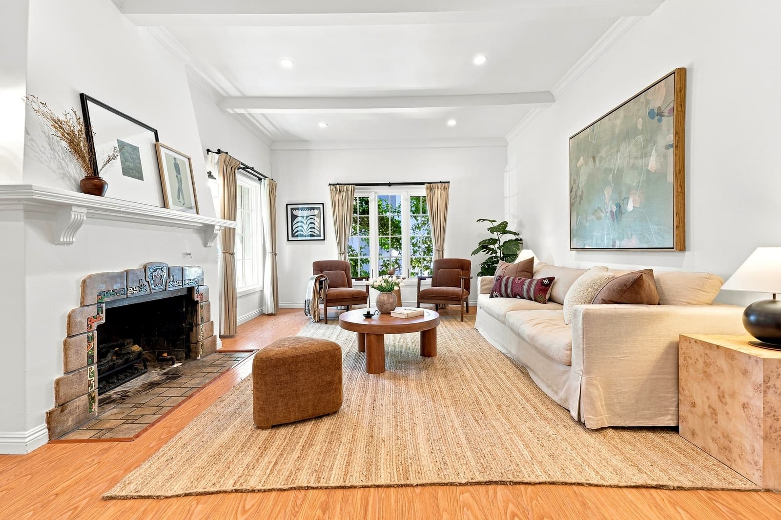 Spanish living room, fireplace and a curved sofa