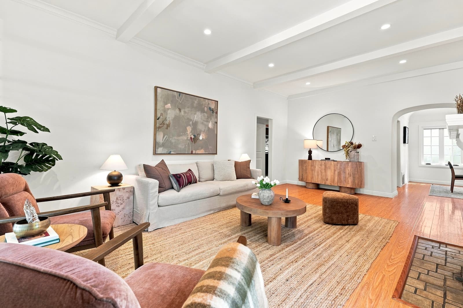 A Spanish living room framed by an arched doorway.