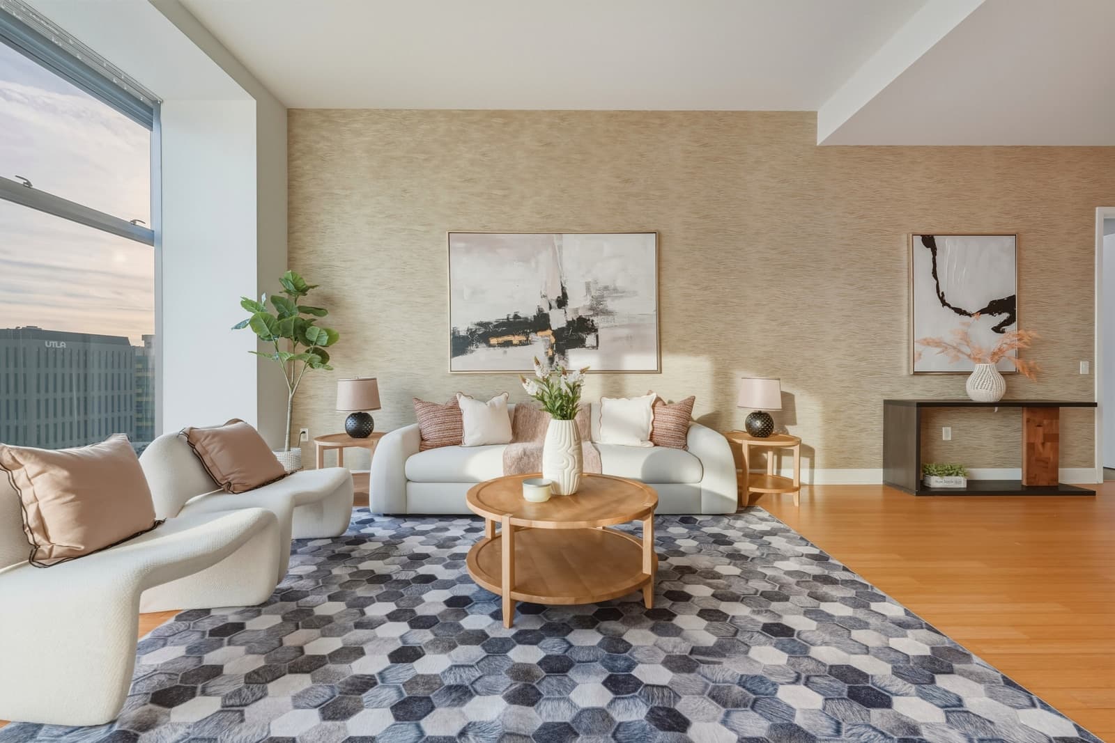 Staged living room with a view of the city skyline