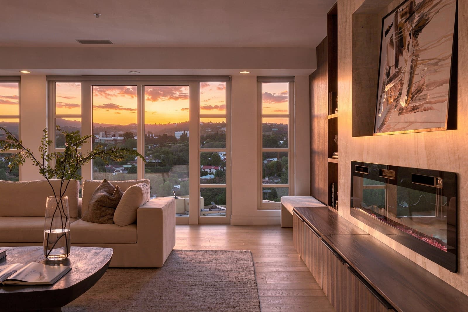 Sunset through the living room windows of a Wilshire Corridor condo